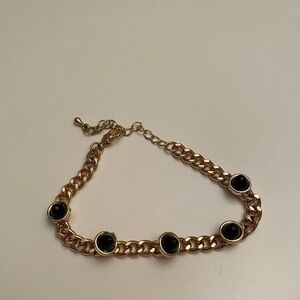 Gold and black spike bracelet